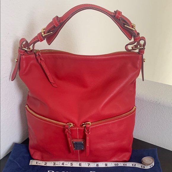 Vintage Dooney & Bourke Vibrant Red Leather HoboBag with Gold Hardware.